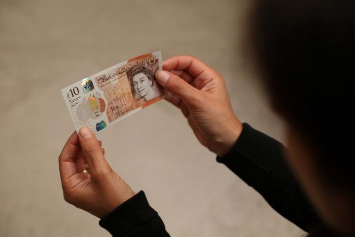 Person looks at new ten pound note